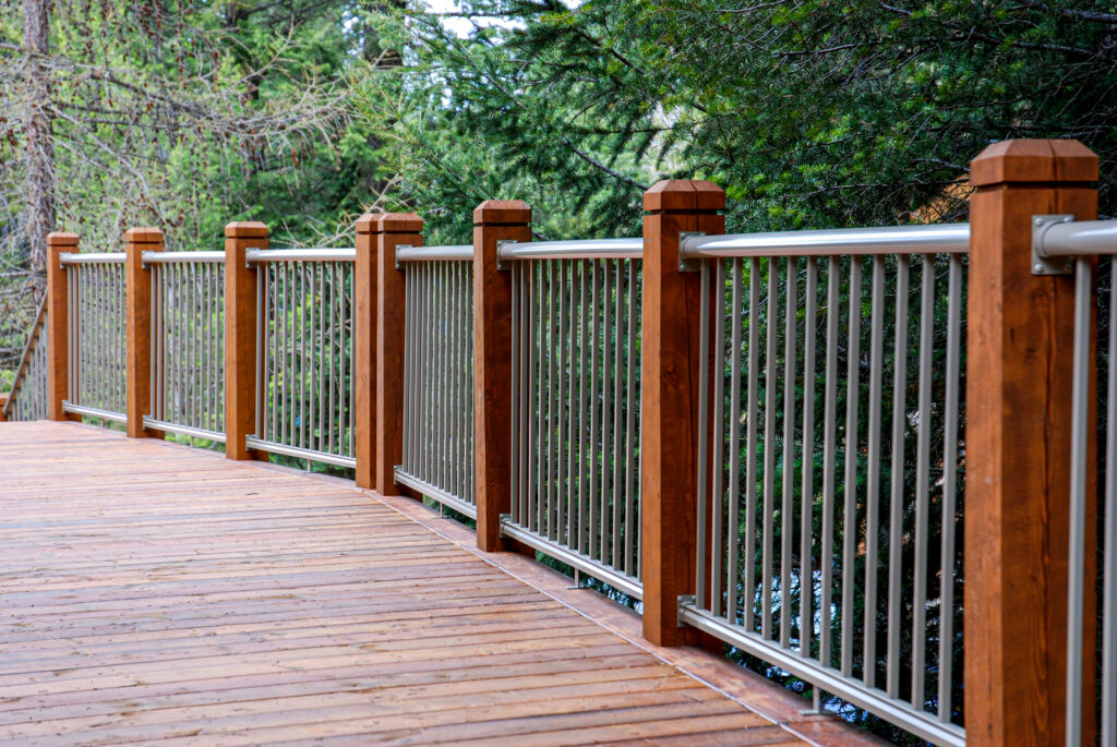 Picket Railing with wood balusters and thick top and bottom rails for maximum durability